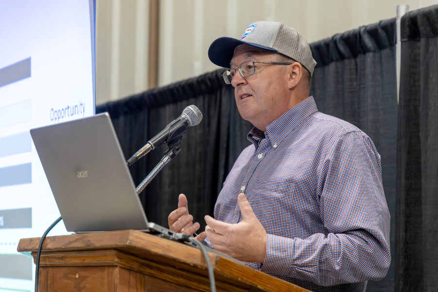 A man speaking at a podium